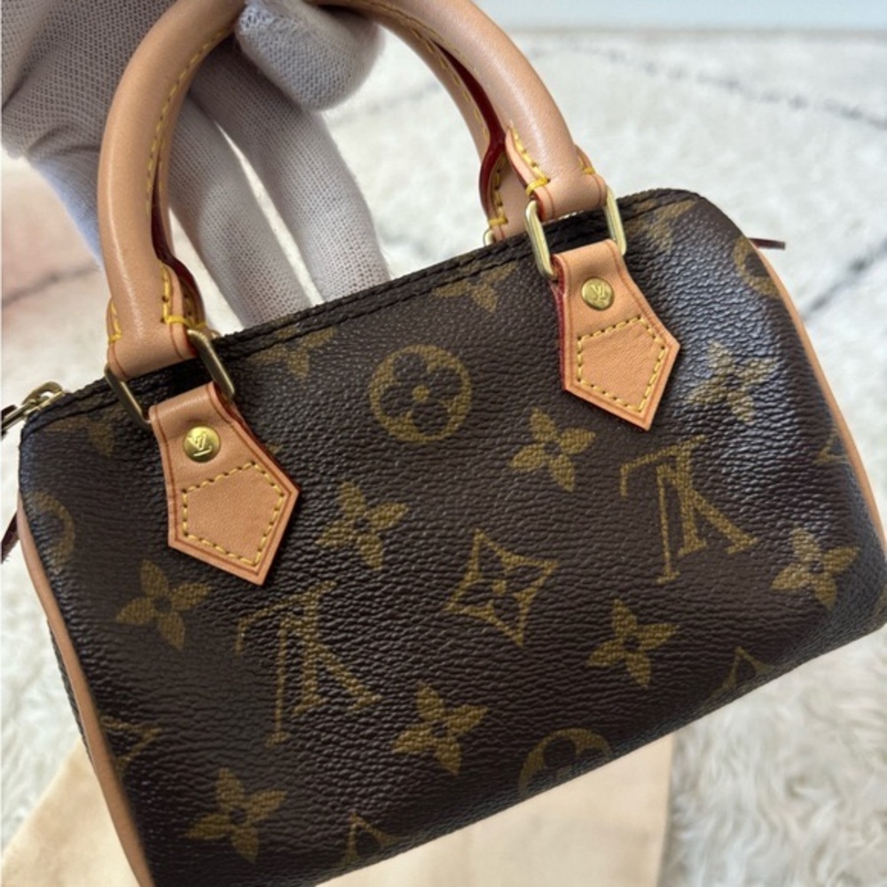 LOUIS VUITTON  Monogram Mini Sac HL Speedy - VINTAGE AND LIKE NEW.